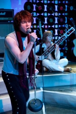 Mick (Nick Vidal) sings while Brian (Aaron Snook) plays the sitar Photo